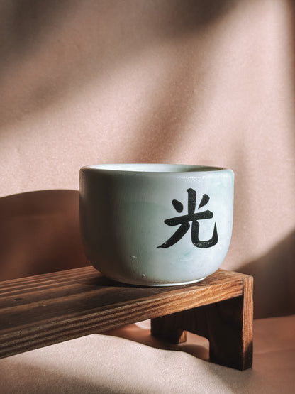 Vela pequena branca e verde - Edição black week