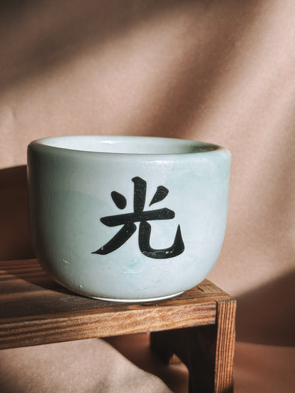 Vela pequena branca e verde - Edição black week