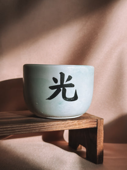 Vela pequena branca e verde - Edição black week